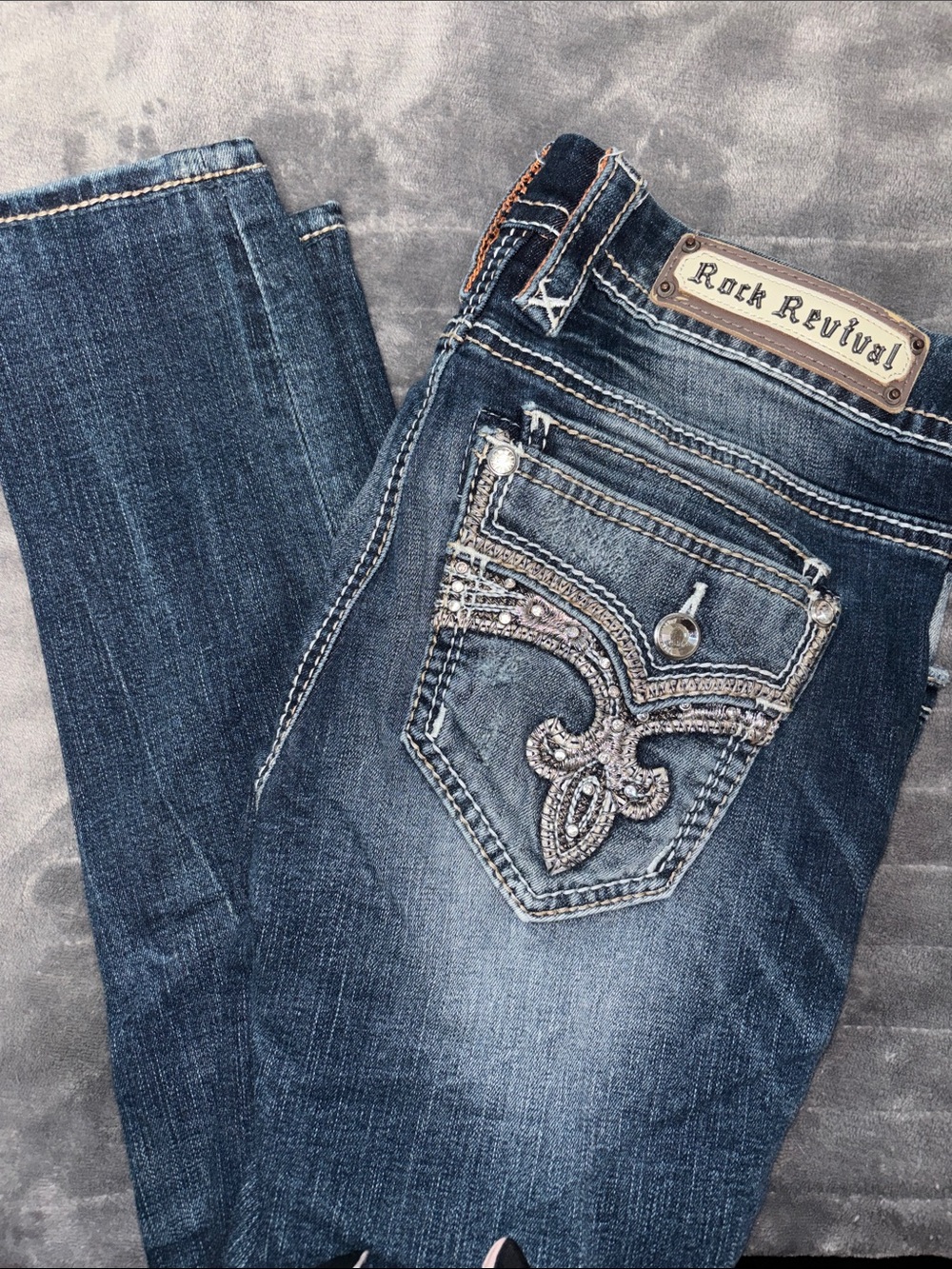 Rock Revival Women's Dark Blue Ripped Skinny Jeans with Embellished Back Pockets